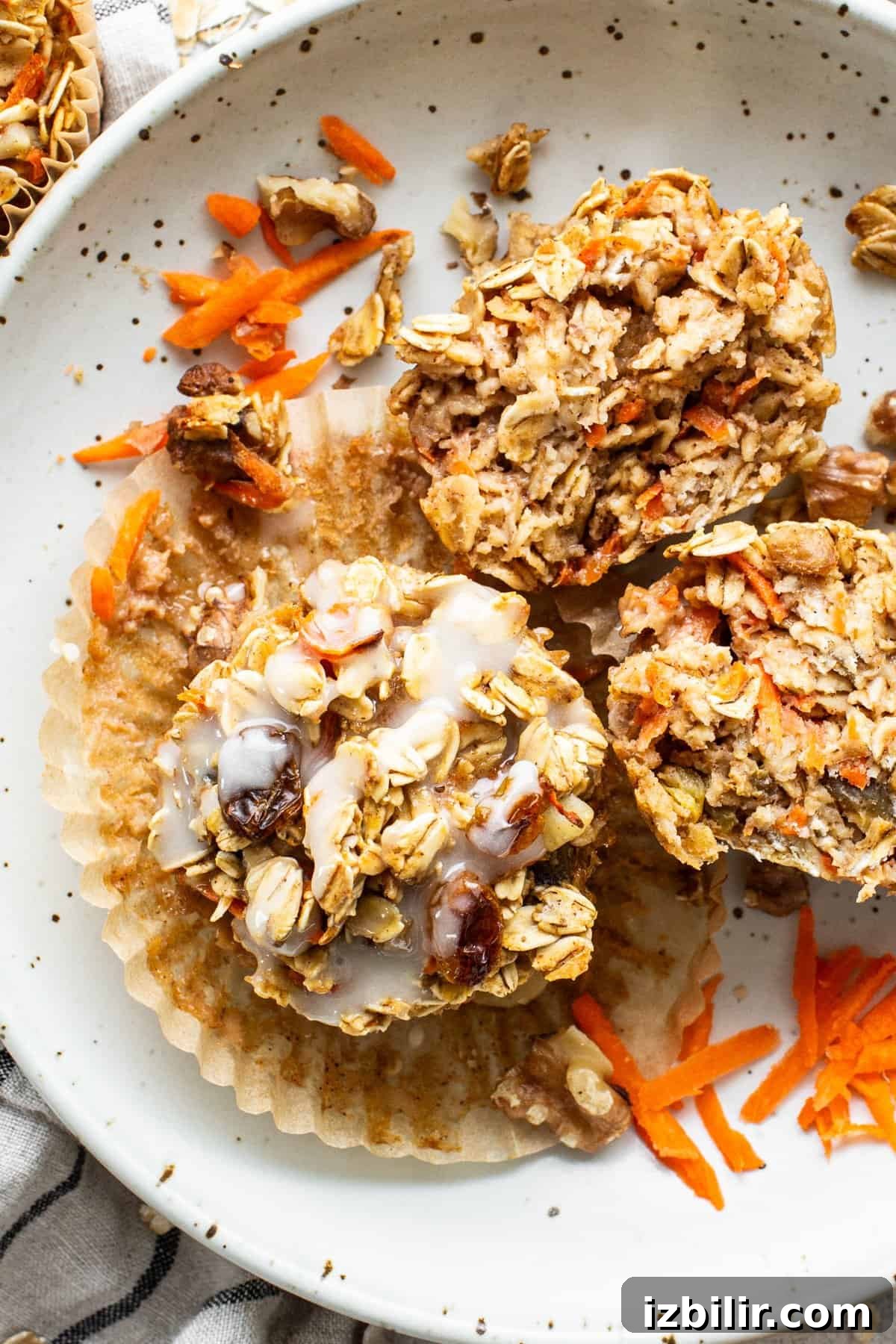A plate with granola muffins on it.