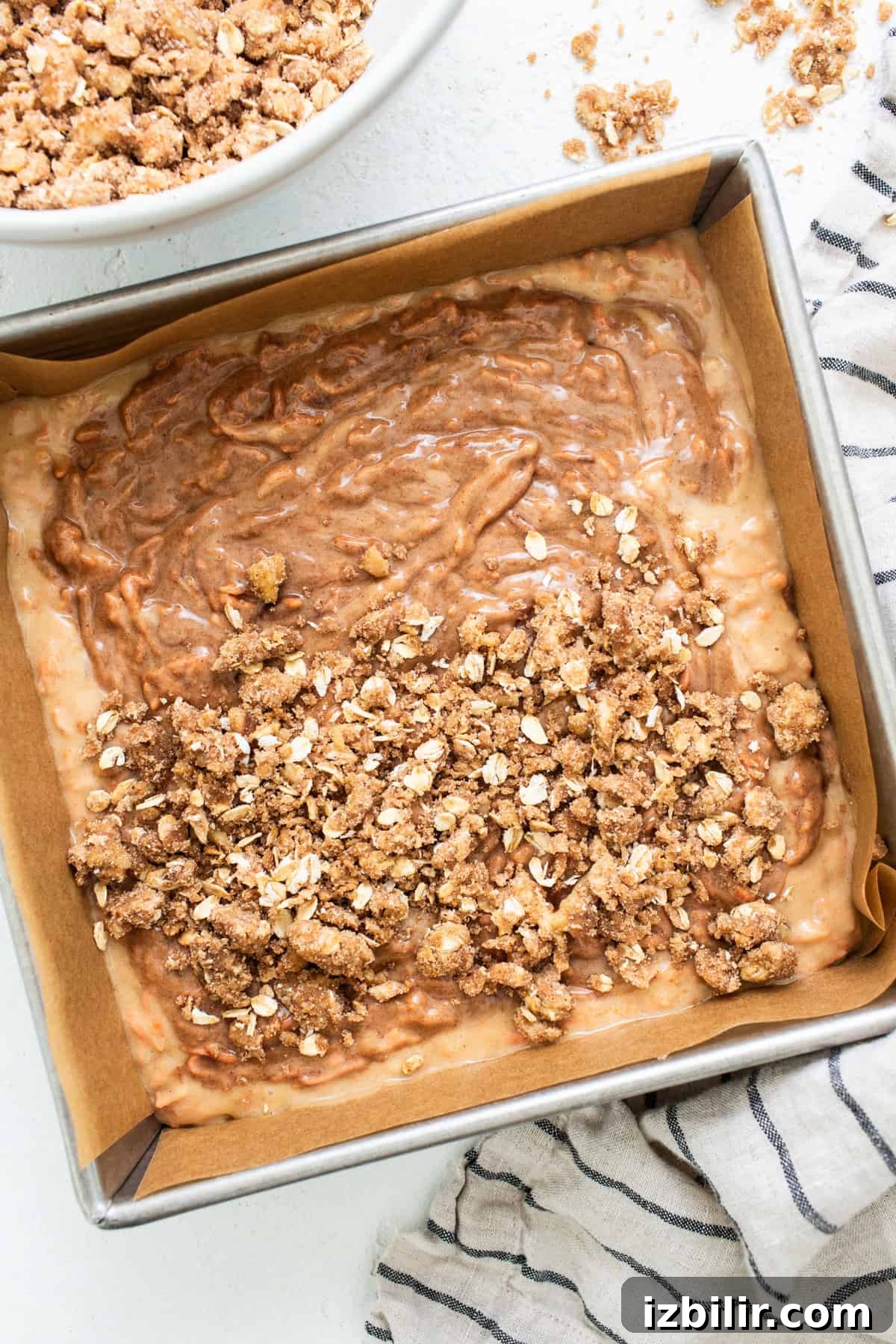 Spiced Carrot Coffee Cake with Cream Cheese Glaze 4 A baking pan filled with granola and granola.