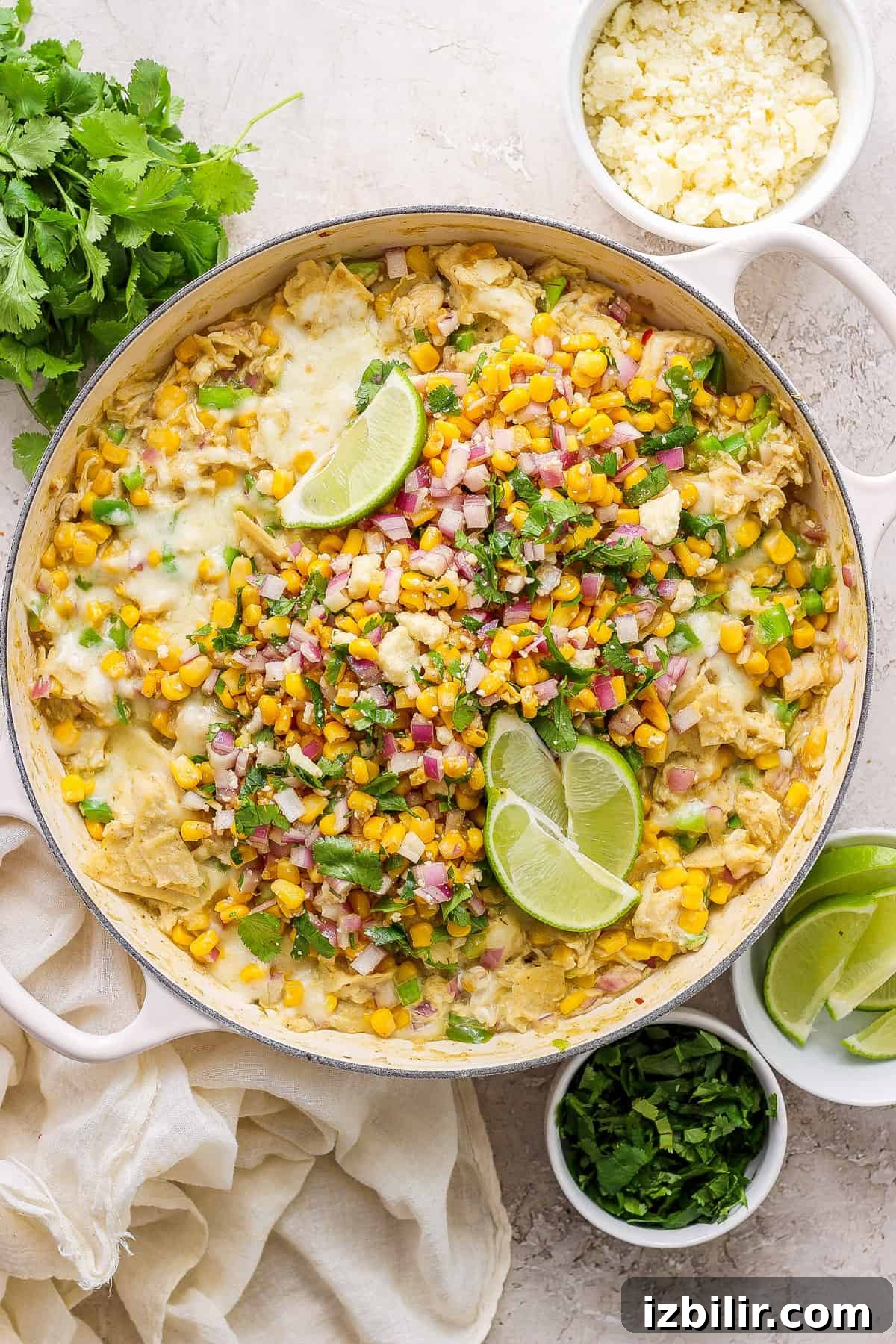 Mexican corn enchiladas in a skillet.