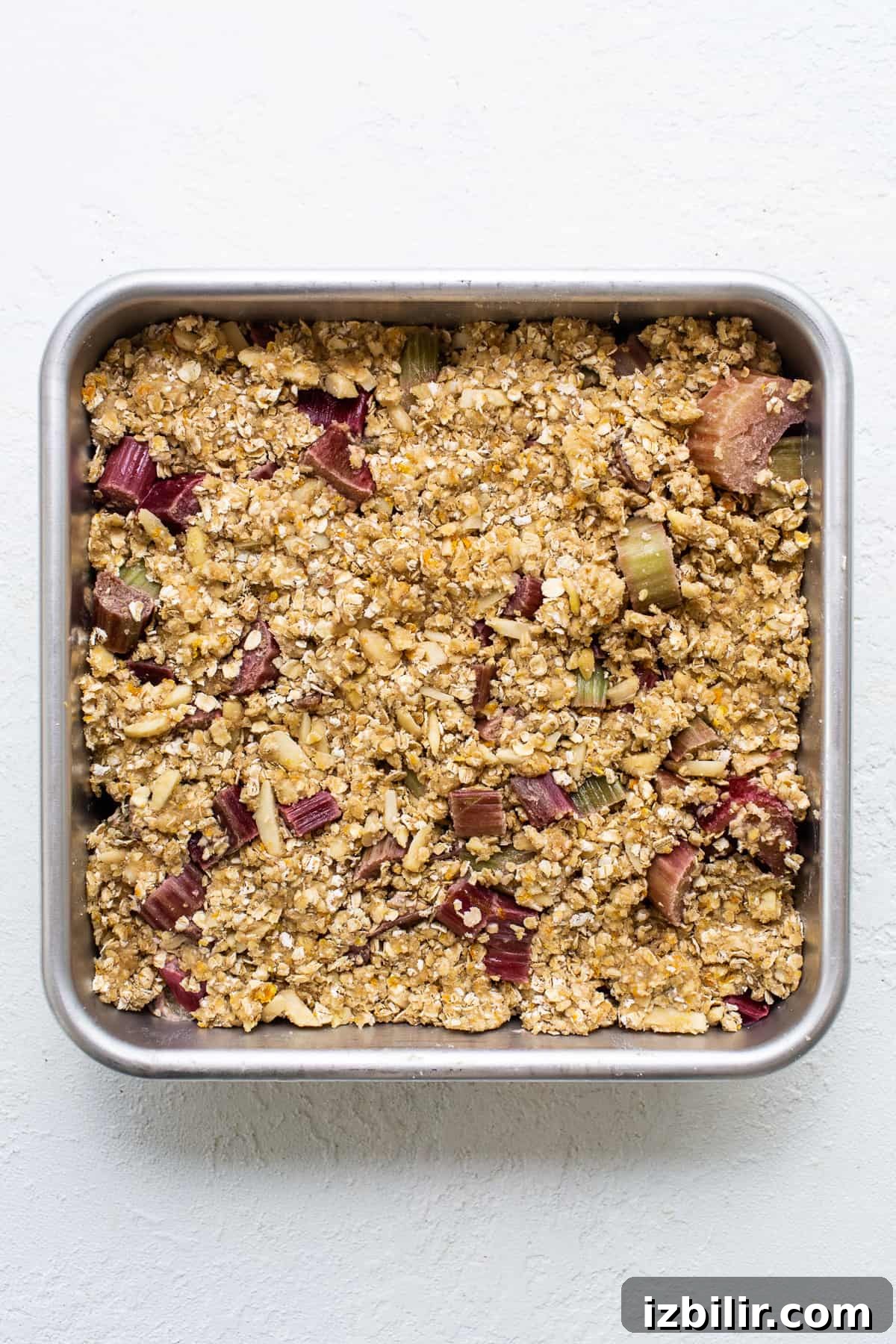 Honey Rhubarb Crisp Recipe with Brown Butter Oat Topping 4 Crisp topping in a metal pan