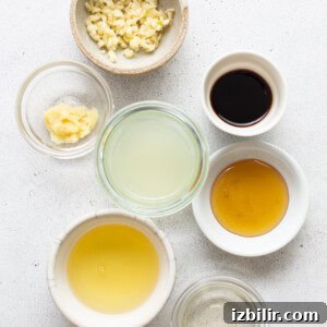 A bowl of ingredients for a chinese fried rice.