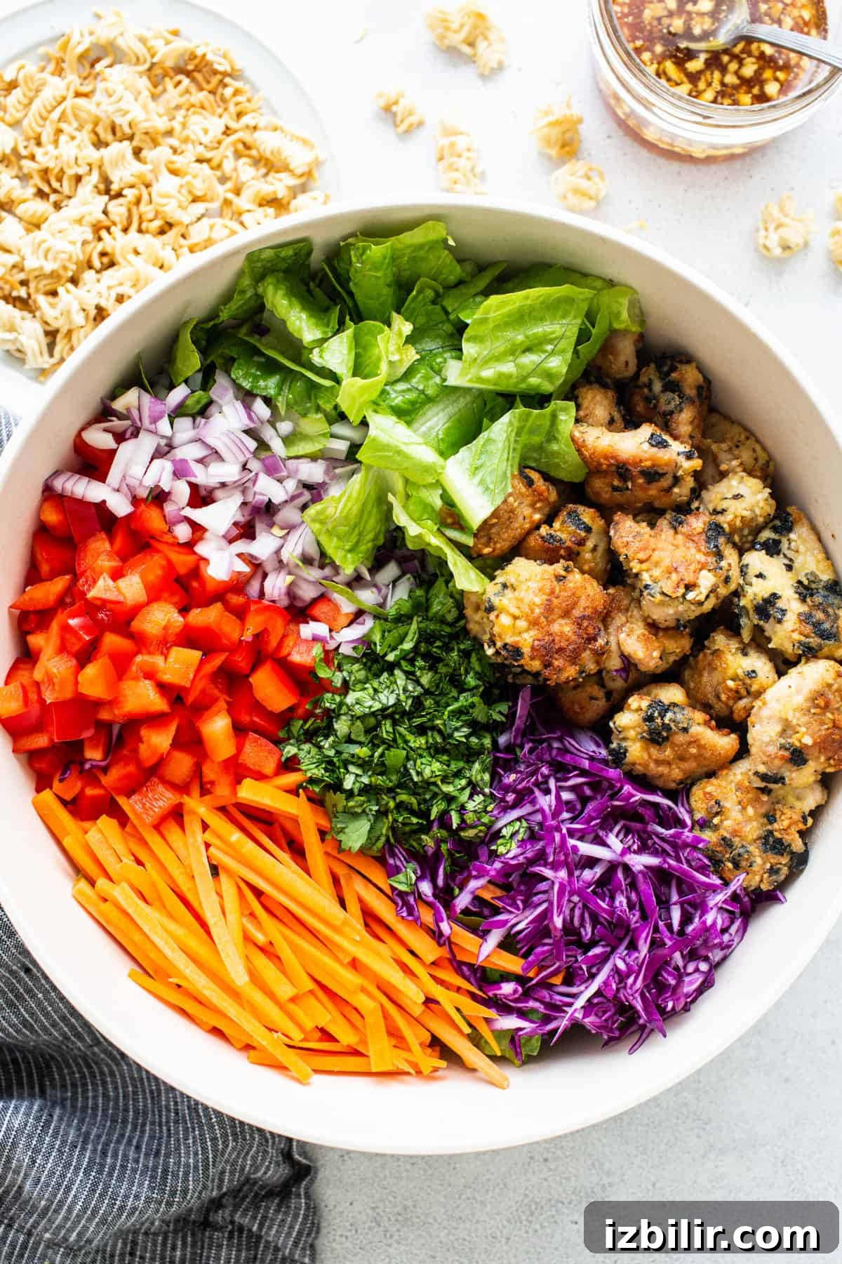 Chicken salad ingredients in a bowl.