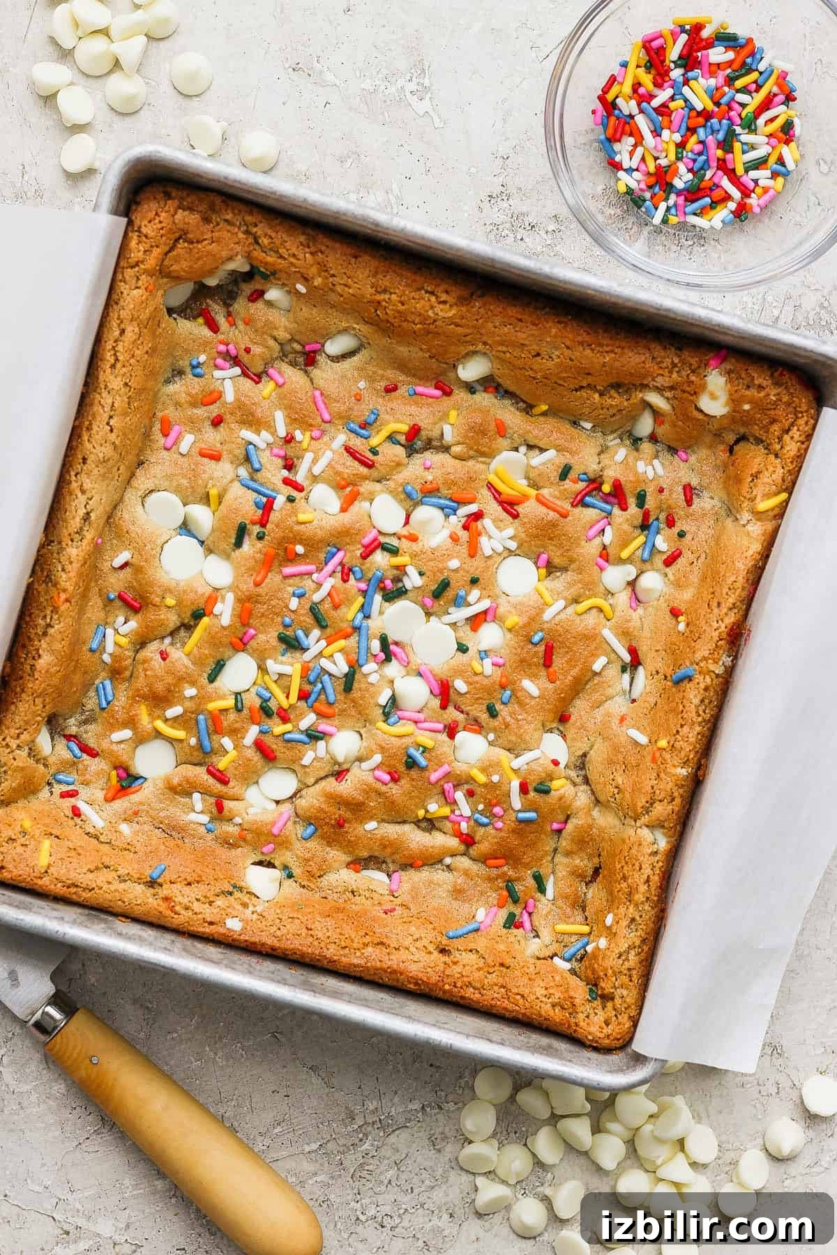 White Chocolate Funfetti Blondies Recipe 4 A cake with sprinkles in a pan.