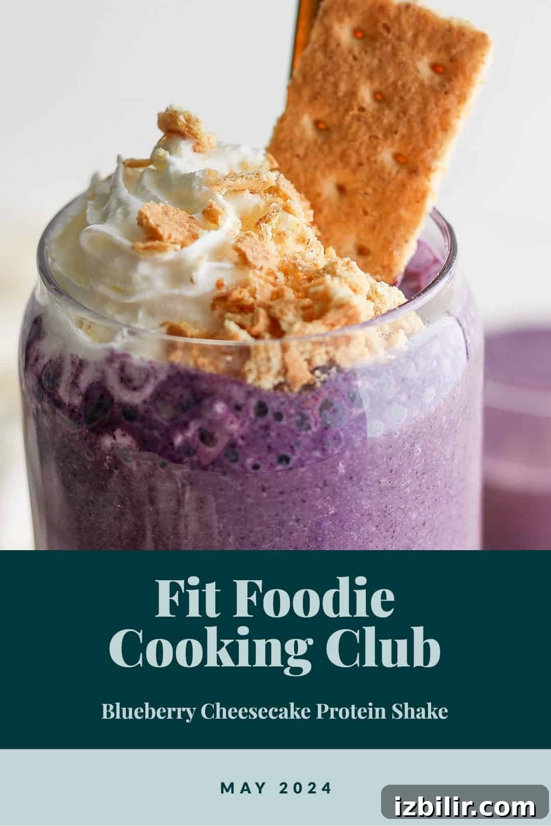 Fit Foodie Cooking Club: May 2024 Seasonal Recipes 2 Blueberry cheesecake protein smoothie in a glass jar