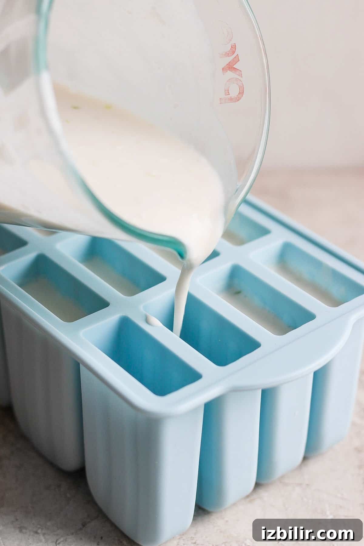 Popsicle molds with coconut key lime mixture