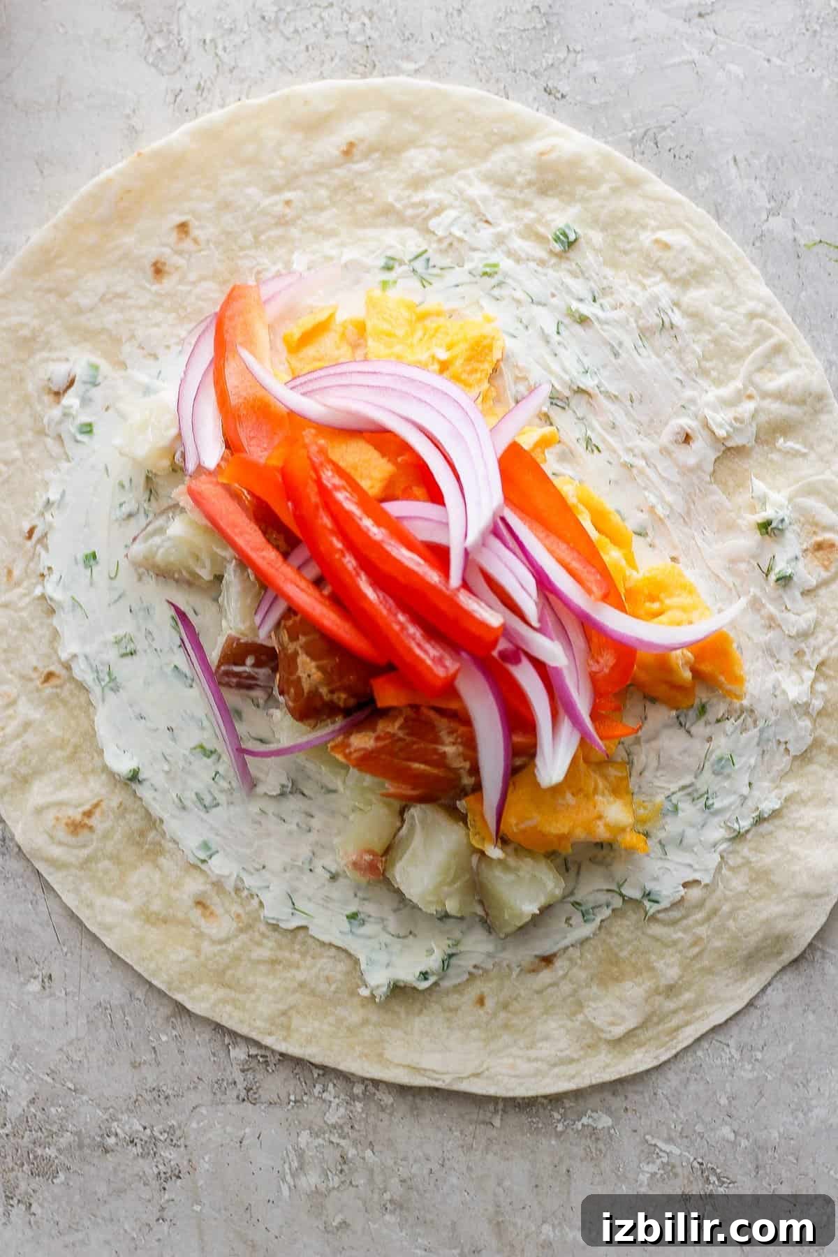 Tortilla with herb cream cheese and vegetables