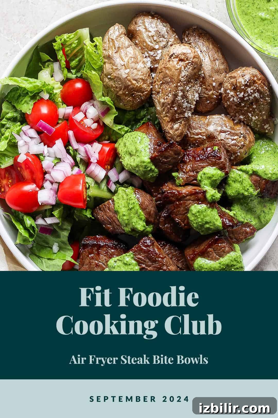 Fit Foodie Cooking Club: September 2024 Seasonal Recipes 2 A bowl with steak bites, roasted potatoes, salad, and green sauce. Text at the bottom reads: 'Fit Foodie Cooking Club - Air Fryer Steak Bite Bowls - September 2024.'