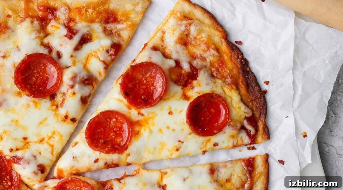 High-Protein Cottage Cheese Recipes for Fall 3 Slices of pepperoni pizza on parchment paper.