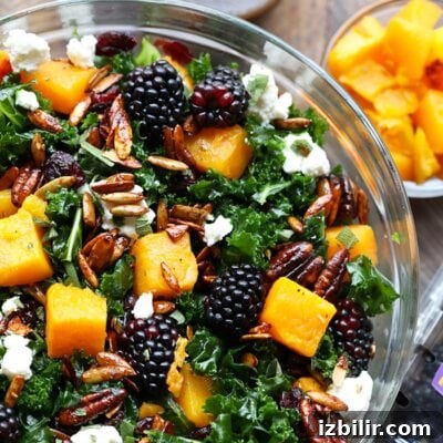 Thanksgiving Sides Worth Serving (Everything But Turkey) 16 A butternut squash massaged kale salad with blackberries and walnuts.