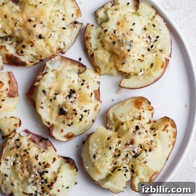 Thanksgiving Sides Worth Serving (Everything But Turkey) 6 Smashed red potatoes on a plate.