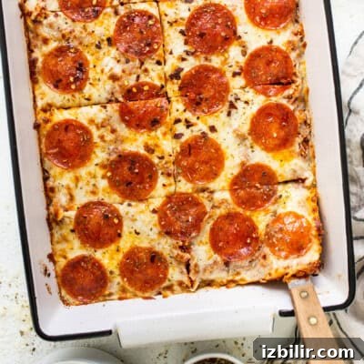 Pepperoni pizza-style quinoa bake in a baking dish