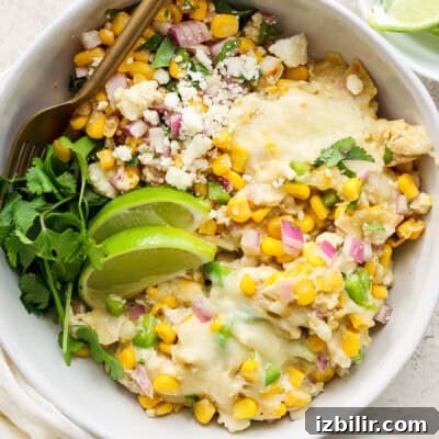 Mexican corn and chicken casserole in a white bowl
