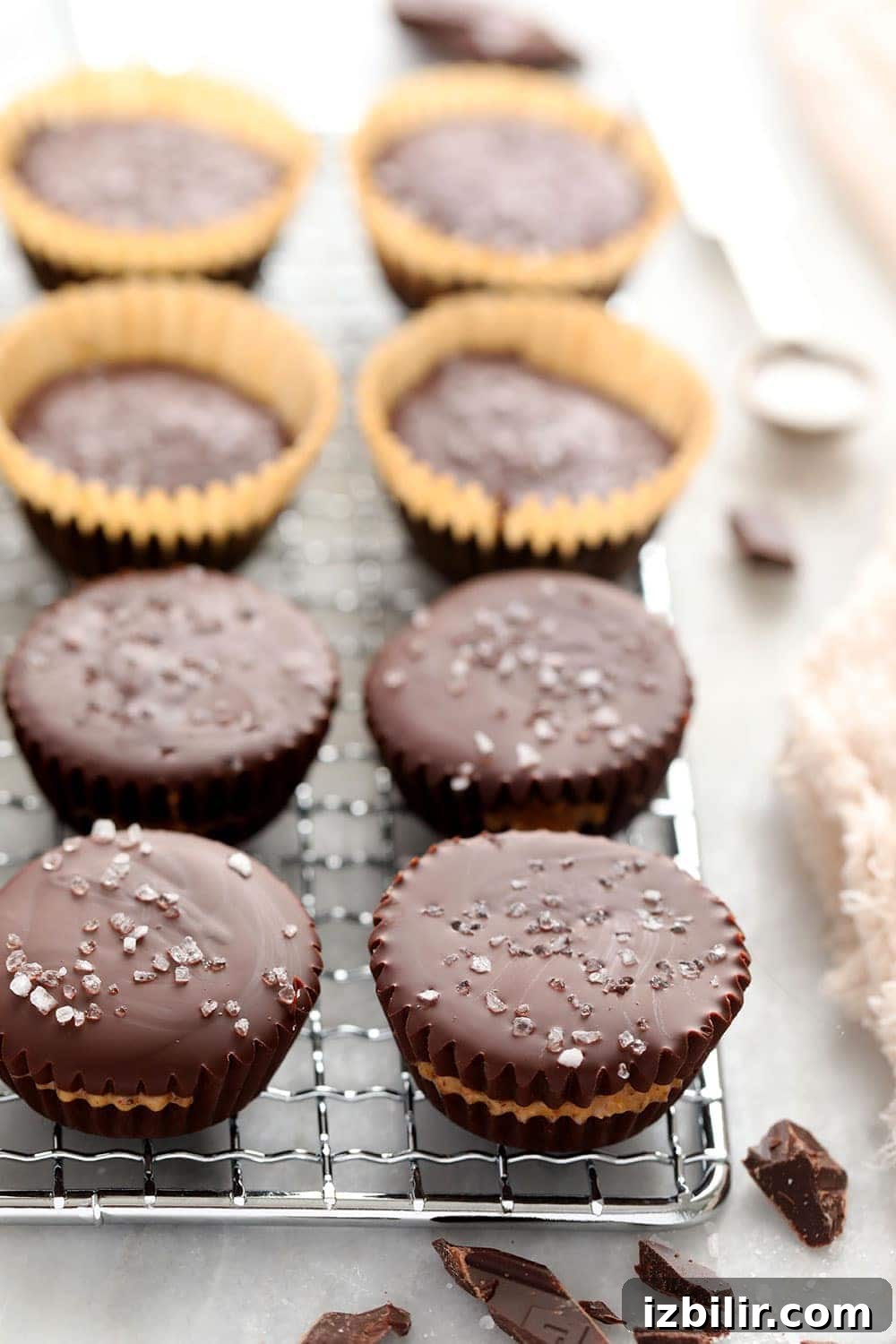 almond butter cups on metal rack
