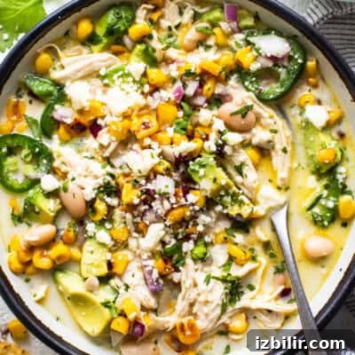 Chicken and corn soup in a bowl.