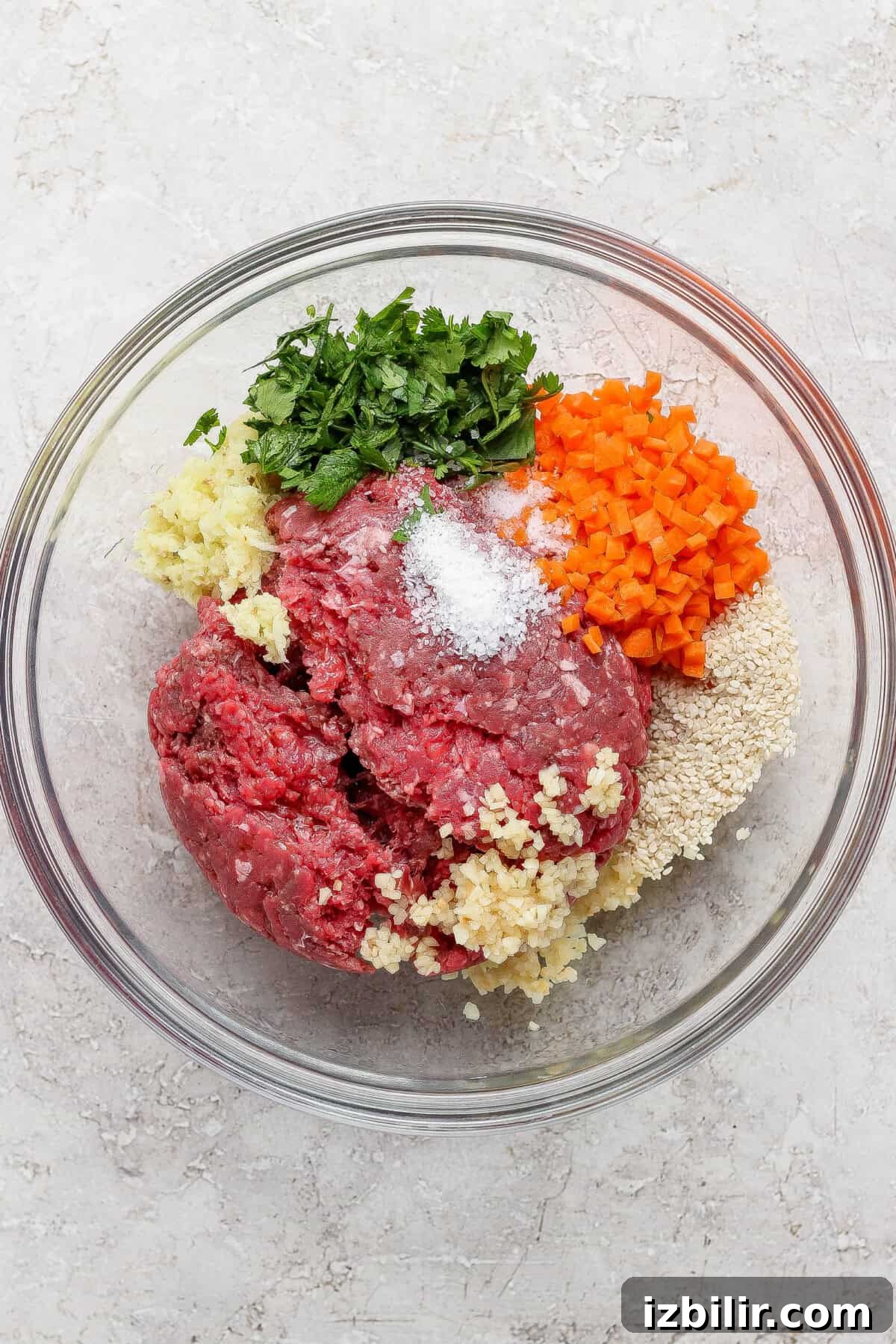 A bowl of seasoned ground beef with chopped vegetables