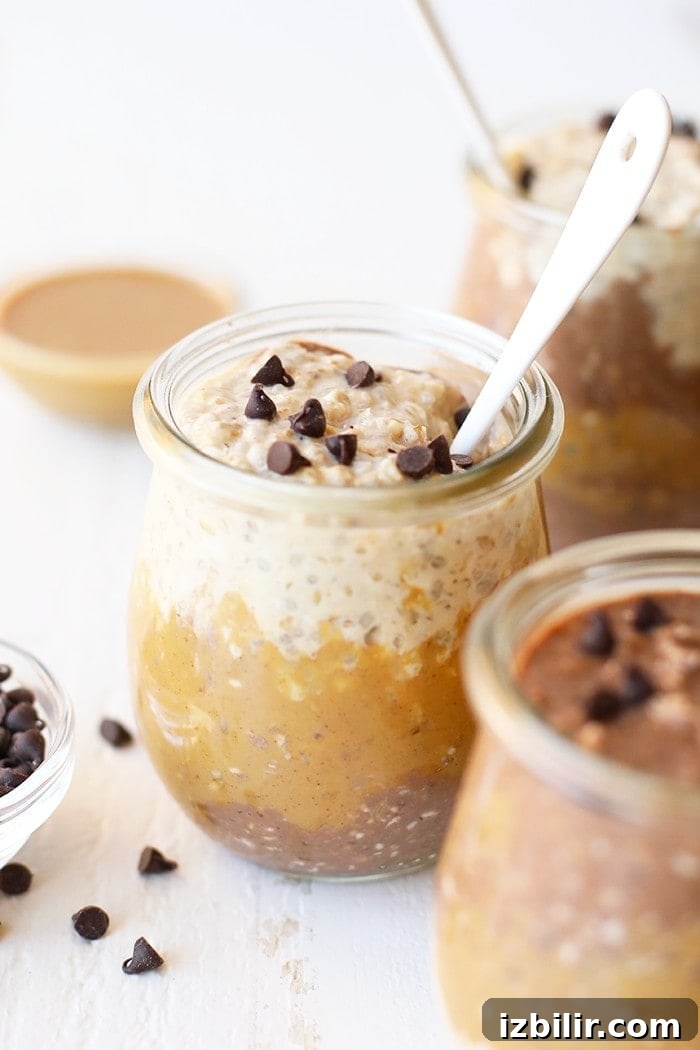 Jars of layered peanut butter and chocolate overnight oats