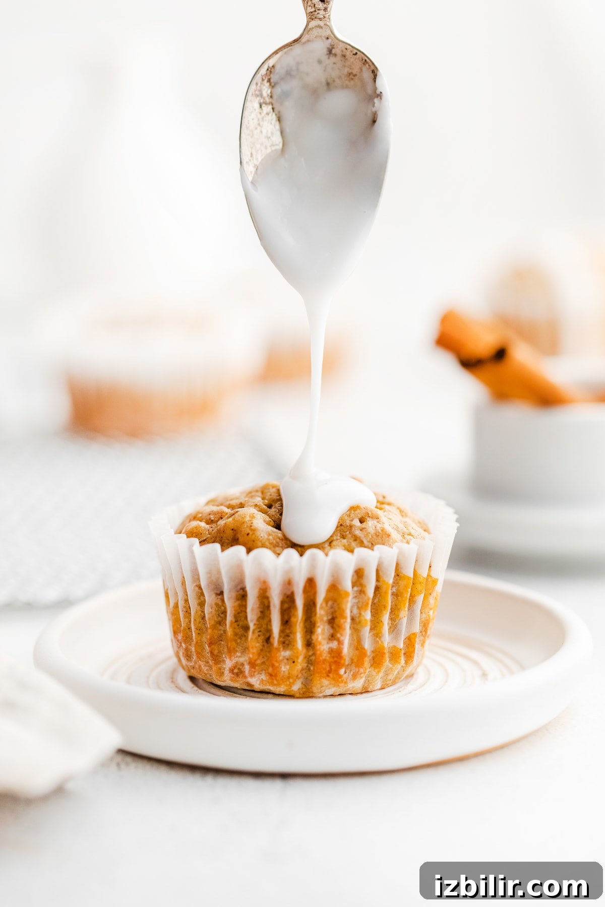 Carrot Cake Muffins are truly delicious any time of year. Our carrot cake muffins recipe is made with whole-grain flour, grated carrots, warm spices, maple syrup and chopped walnuts. carrot muffins with frosting