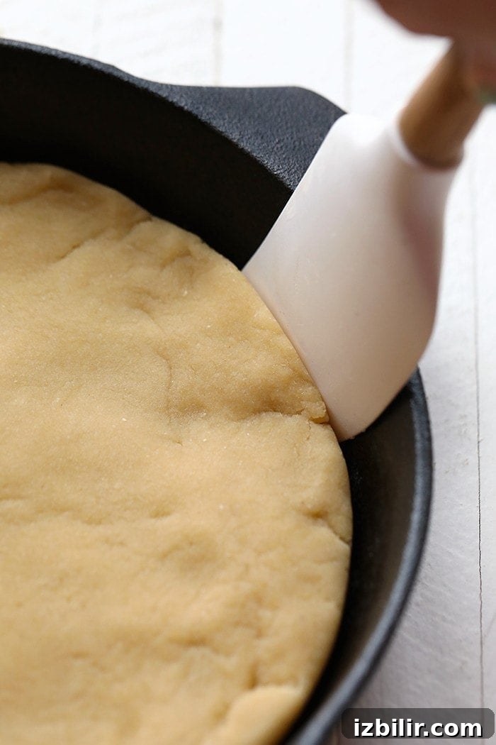 Making gluten free sugar cookie crust for fruit pizza.