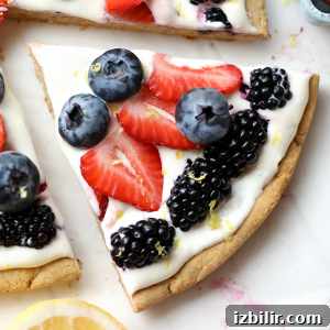 fruit pizza on a marble counter