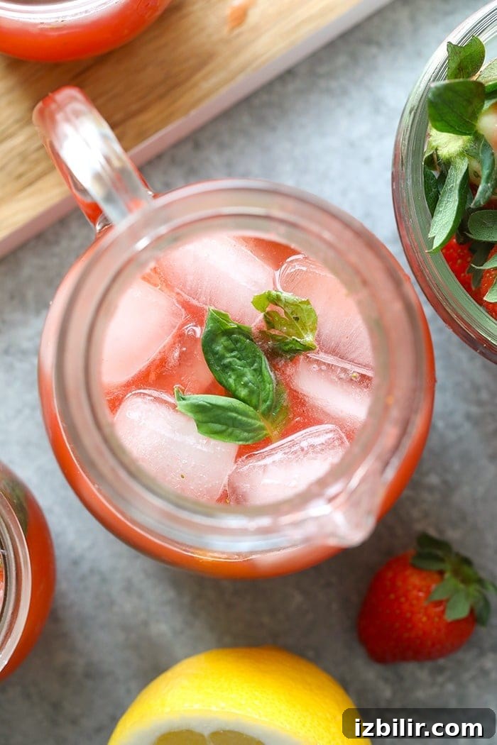 Refreshing Homemade Strawberry Lemonade Recipe 6 strawberry basil lemonade in a pitcher