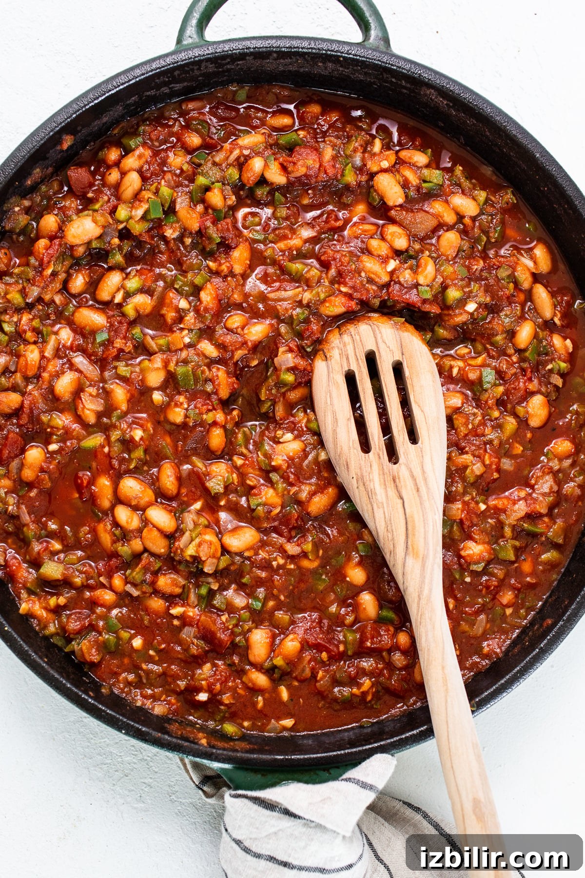 Sauce and beans in cast iron. sauce and beans in cast iron.