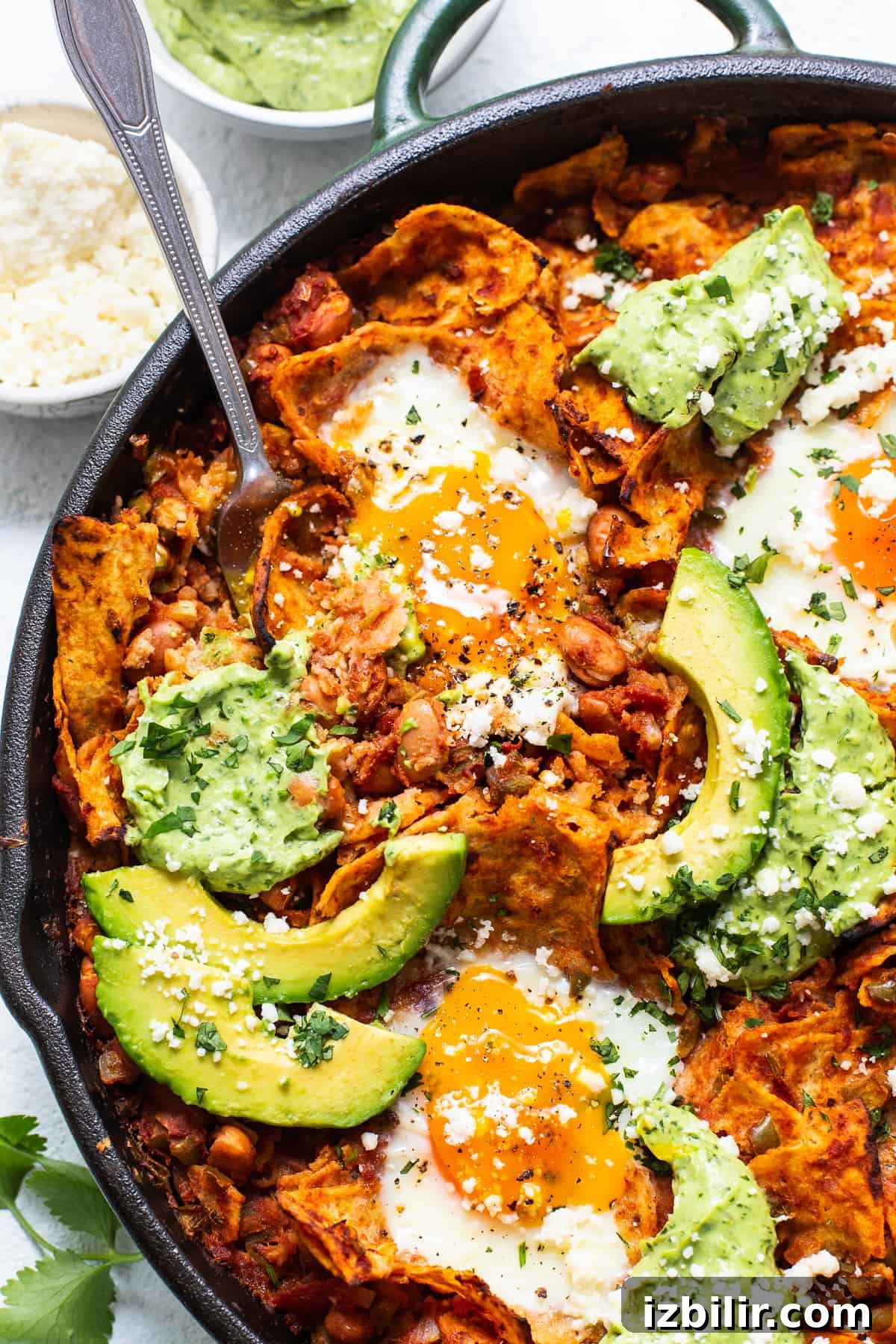 Quick Homemade Chilaquiles Recipe 5 chilaquiles in cast iron.