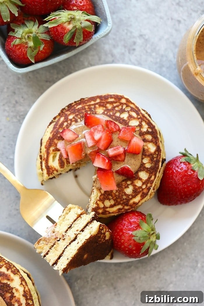 top view of Almond Flour Banana Pancakes with strawberry slices