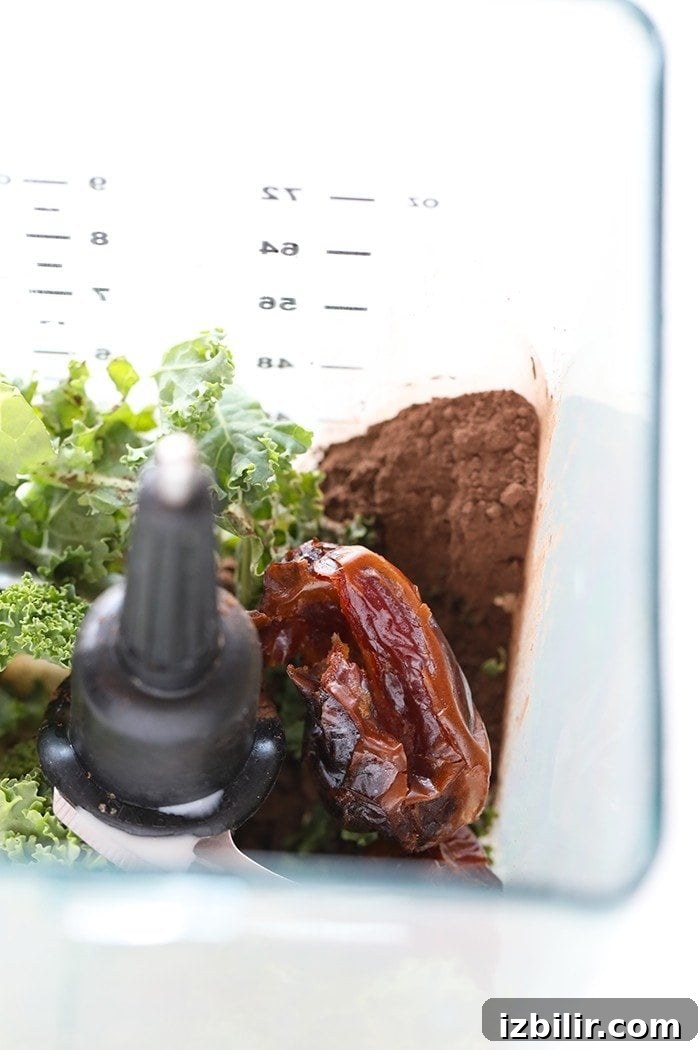 dates, kale and chocolate in blender
