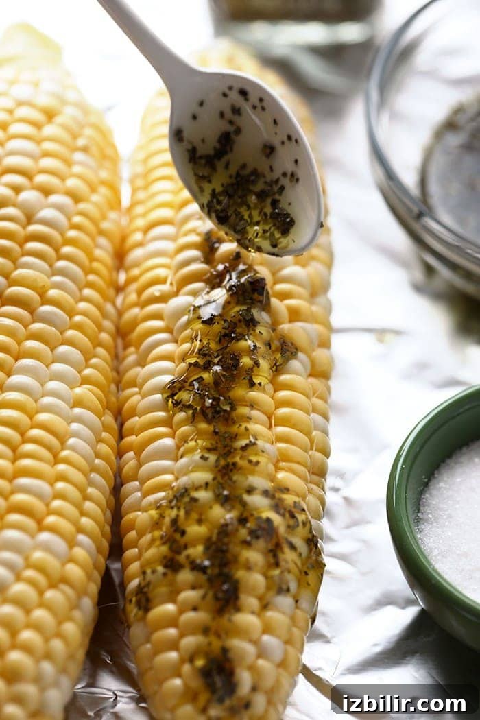 Grilled Mediterranean Street Corn with Feta 3 Mediterranean grilled street corn on a plate with herbs