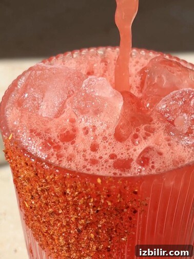 Pitcher of fresh watermelon agua with lime