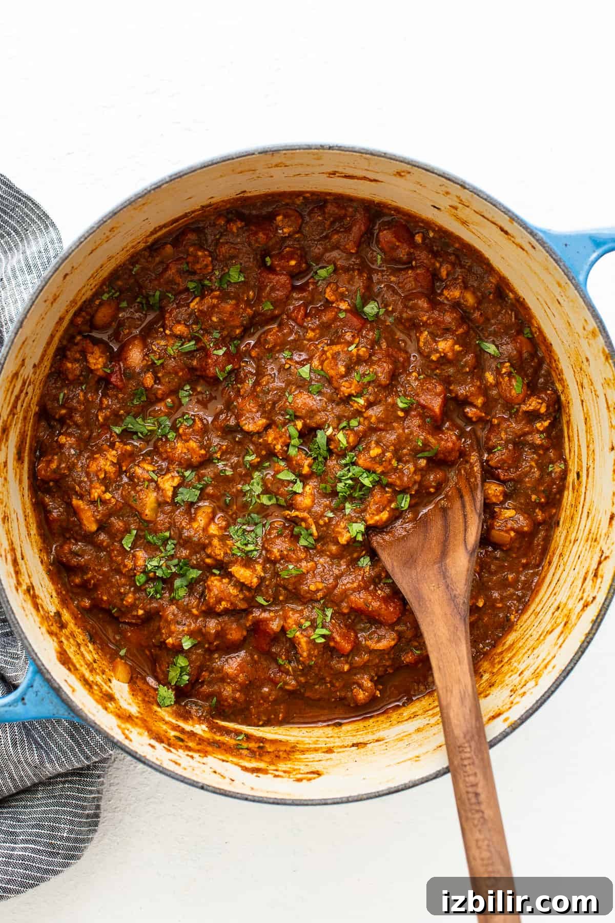 Pumpkin Chili Recipe for Cozy Fall Dinners 5 Turkey pumpkin chili in a Dutch oven.