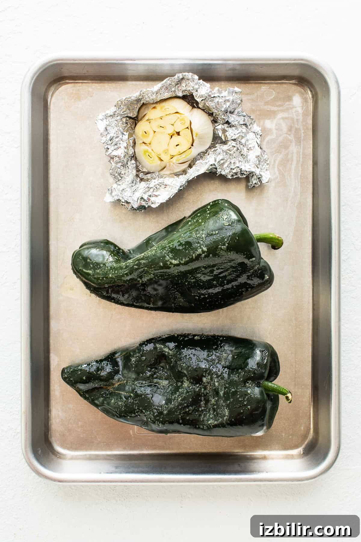 Pumpkin Chili Recipe for Cozy Fall Dinners 3 Roasting poblano pepper and garlic.