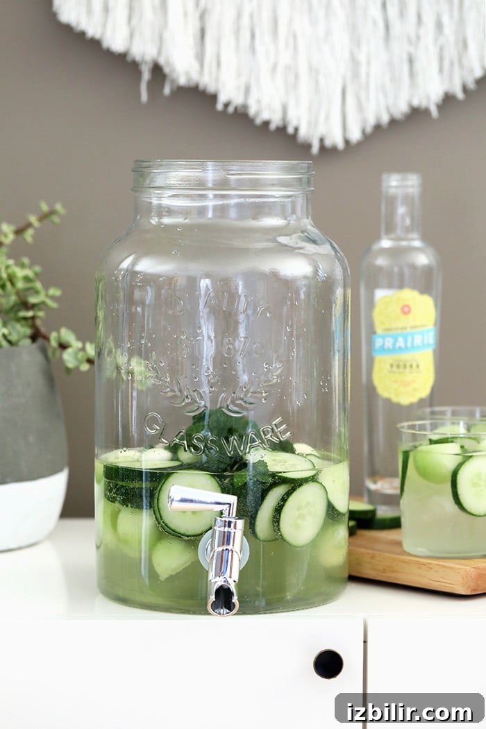 Cucumber Melon Ginger Punch in a dispenser cucumber vodka drink in dispenser