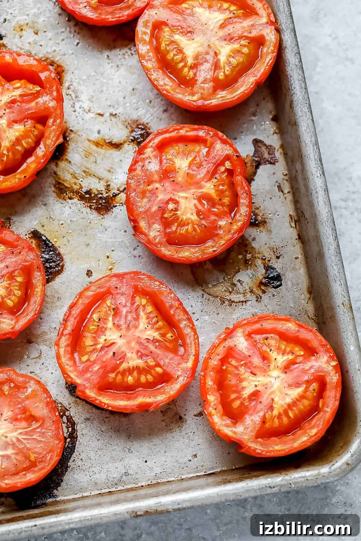 roasted tomatoes on pan.