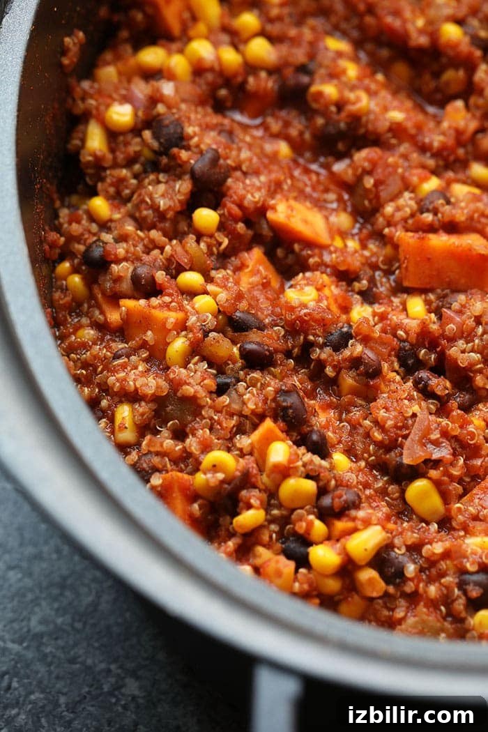 Cooked Mexican quinoa in slow cooker Fully cooked Mexican quinoa in the slow cooker