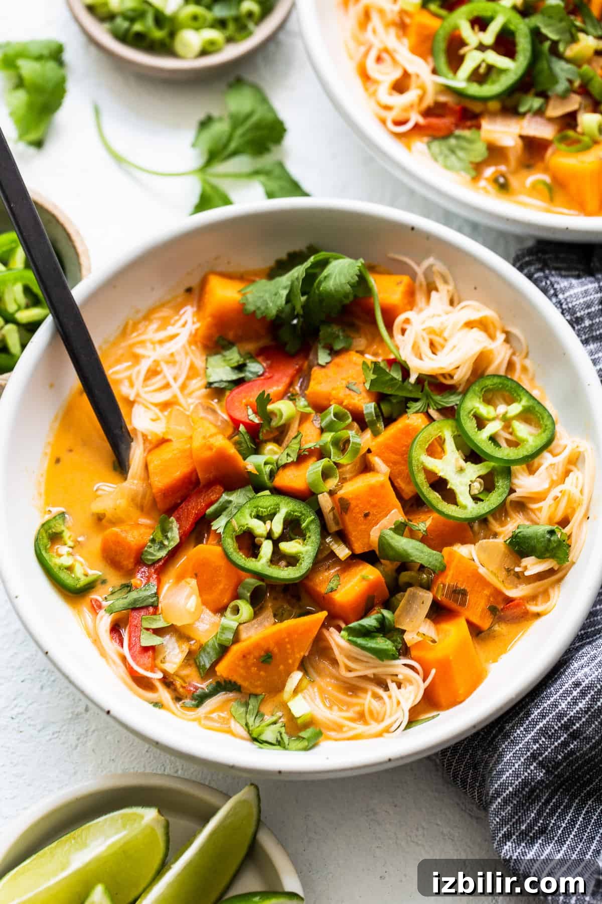 Creamy Thai Coconut Curry Soup with Lime and Ginger 2 Coconut curry soup in a bowl.