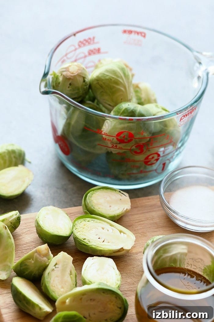 Chopped Brussels sprouts ready for grilling Chopped Brussels sprouts on a cutting board ready for the grill.