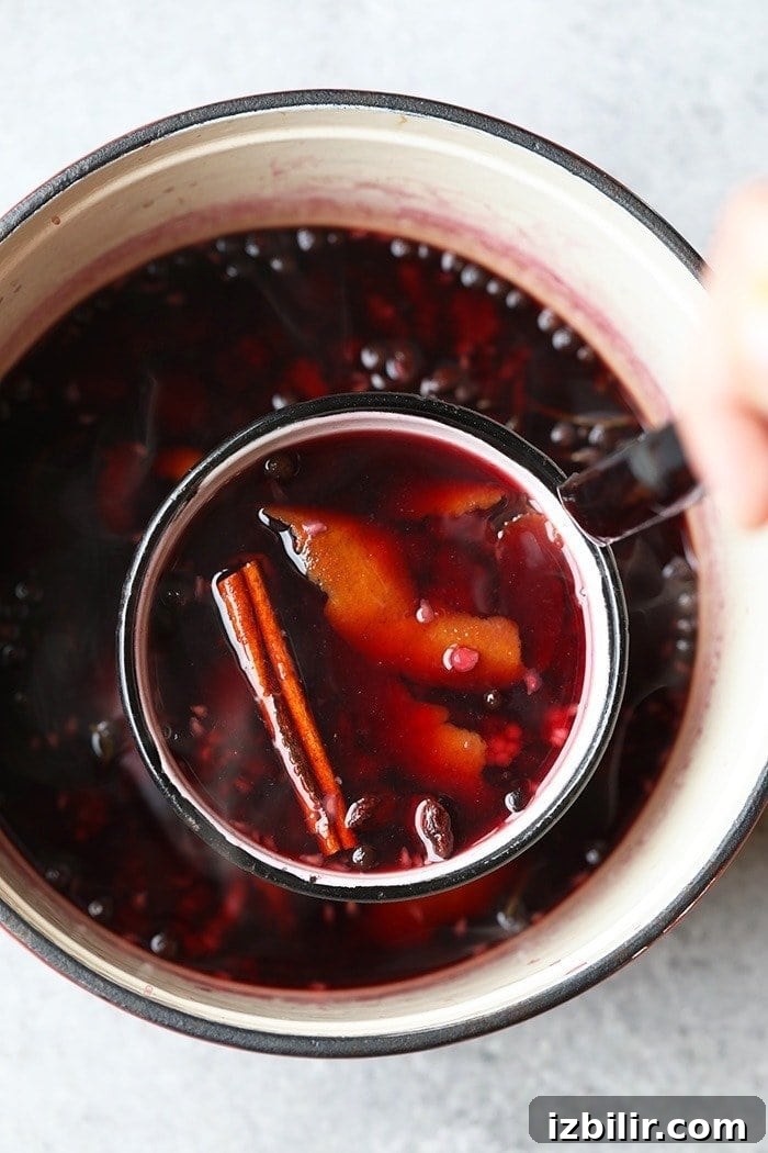 Mulled wine simmering mulled wine in a stock pot simmering to perfection