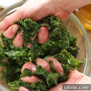 Massaging kale in hands