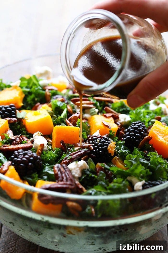 Pouring dressing into salad