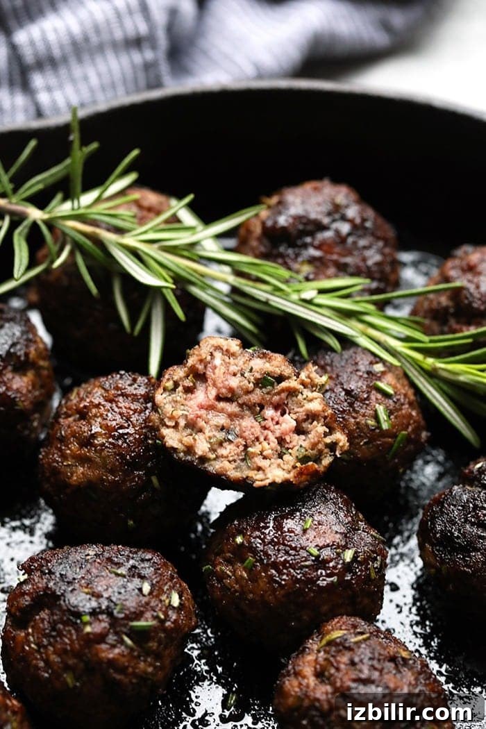 This delicious meatball appetizer recipe is a great holiday appetizer recipe or a general recipe for healthy meatballs, these Rosemary Thyme Balsamic Meatballs really are perfect for every occasion! Meatballs in a cast iron pan