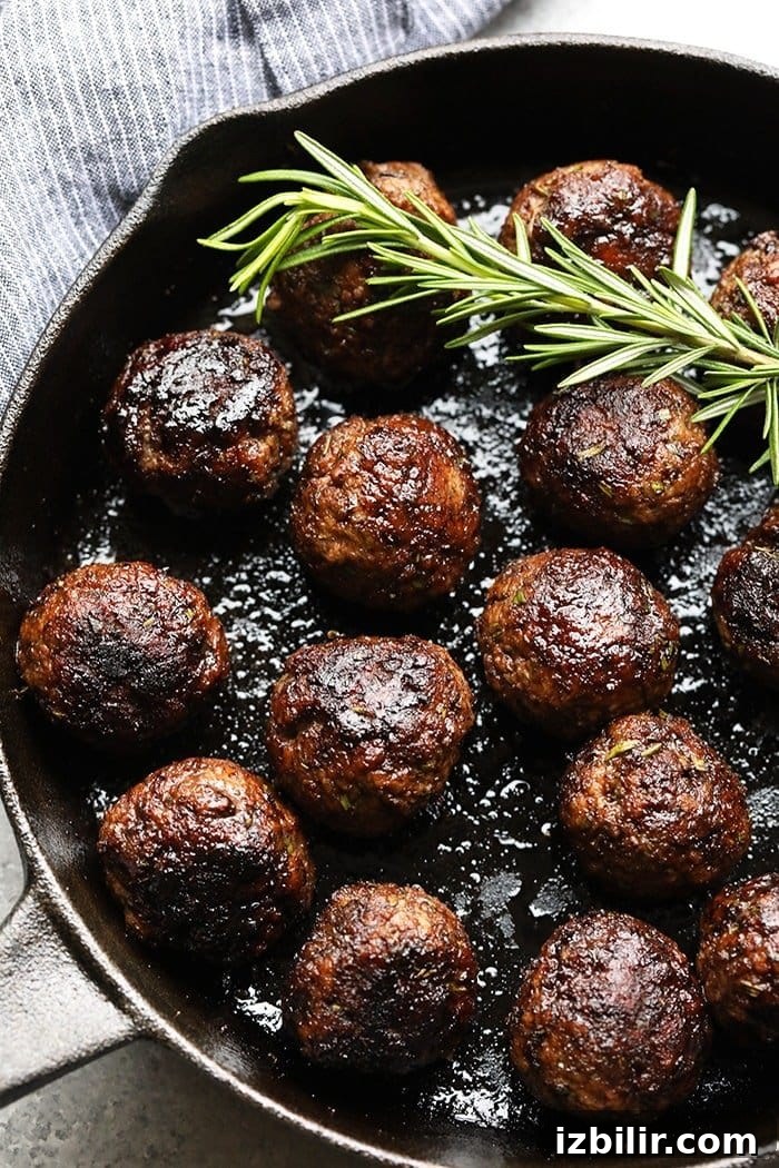 Rosemary Thyme Balsamic Meatballs in a cast iron pan Rosemary Thyme Balsamic Meatballs in a cast iron pan