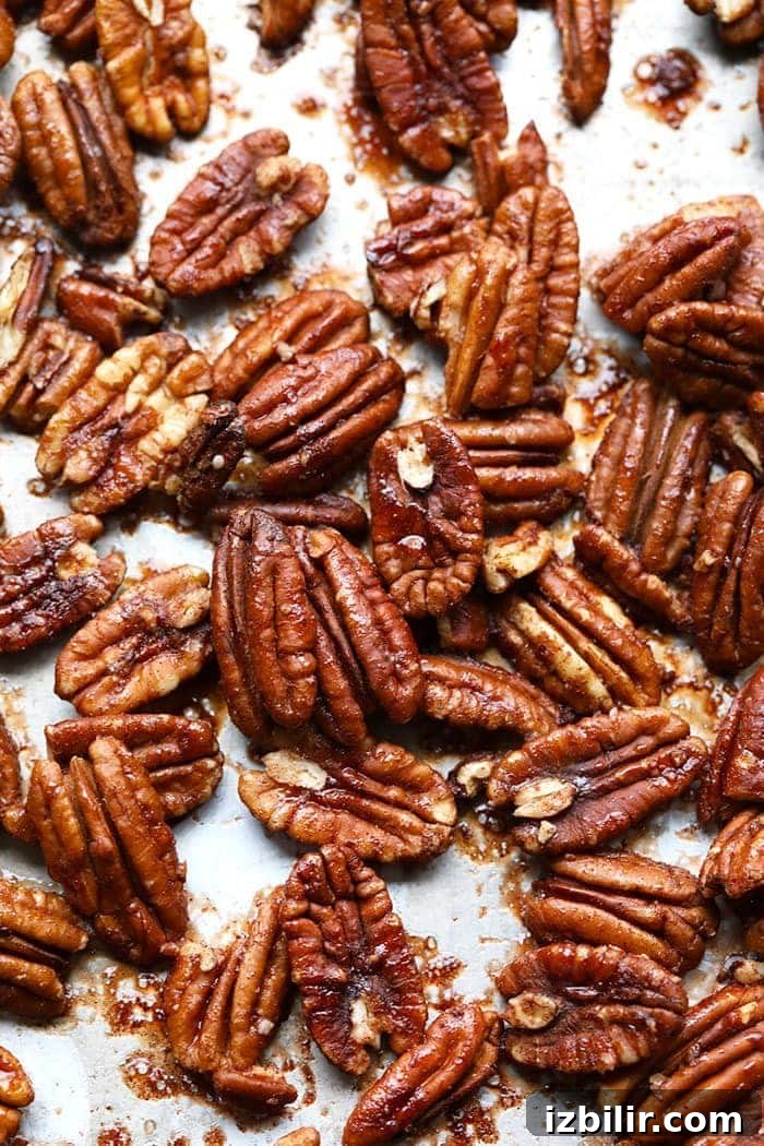 Maple Roasted Pecans Roasted pecans on baking sheet.