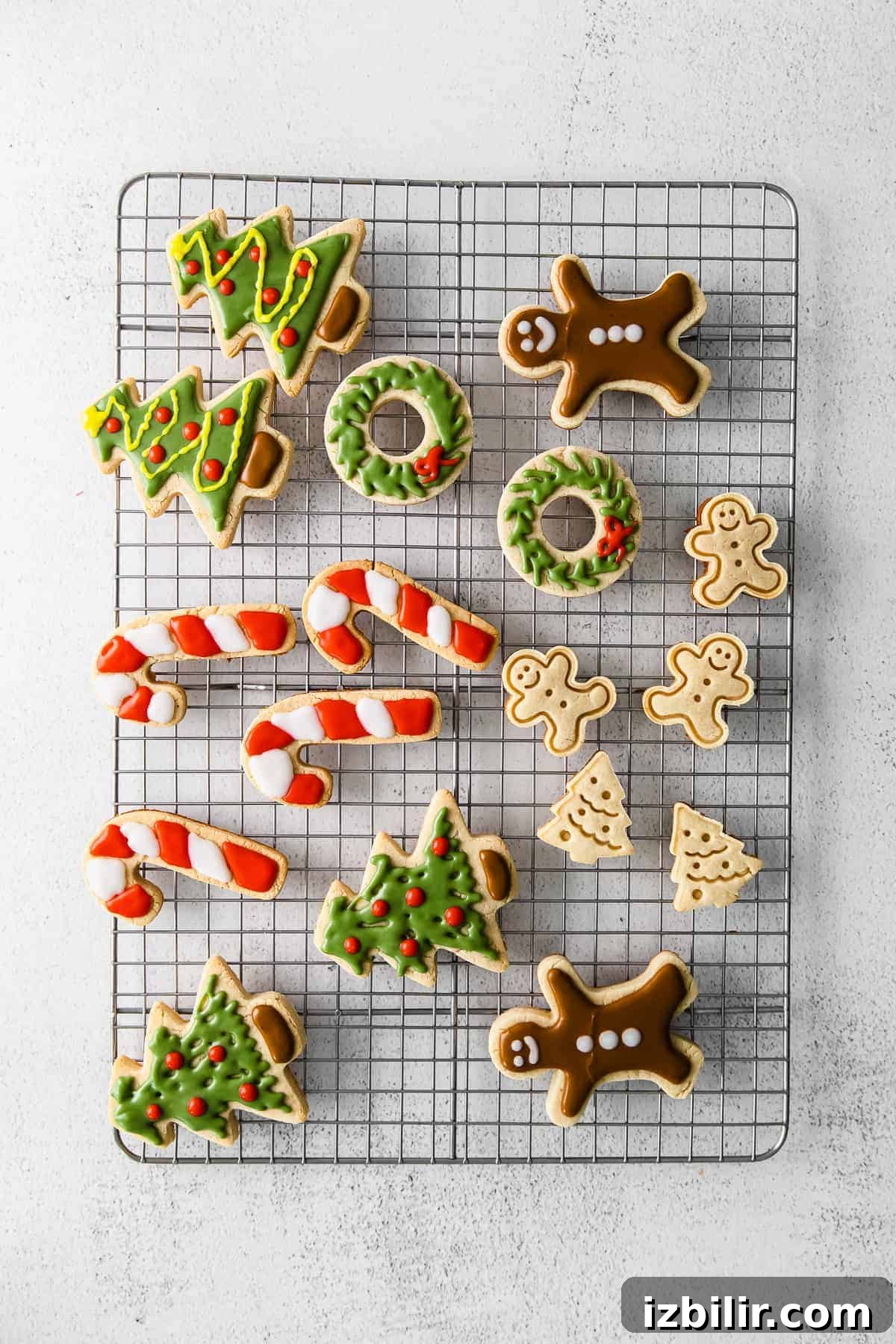 Decorated almond flour sugar cookies on a wire rack Christmas cookies on wire rack