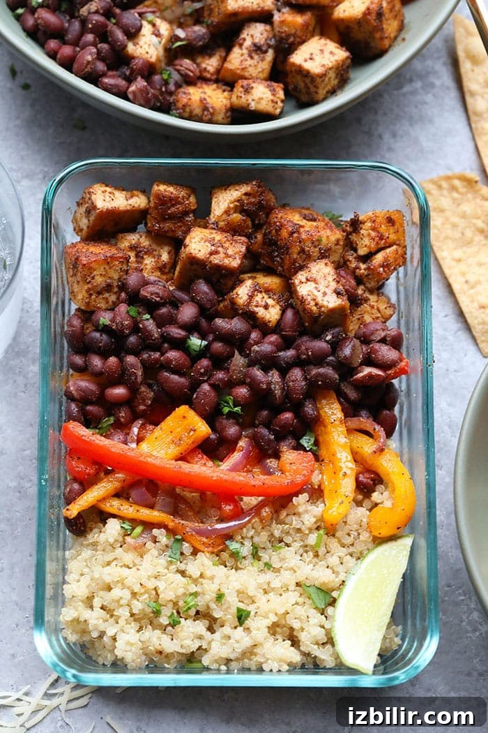 Prepared Tofu Quinoa Burrito Bowl with toppings