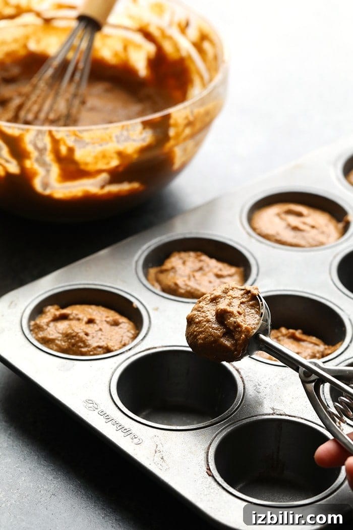 These festive and healthy coconut oil gingerbread muffins are made with 100% whole wheat flour, coconut oil, and tons of spicy flavors to make these delicious healthy muffins perfect for the holidays! Gingerbread Muffins
