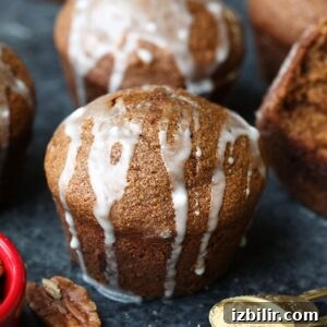 Pecan muffins with a touch of icing and pecans transformed into delicious gingerbread muffins.