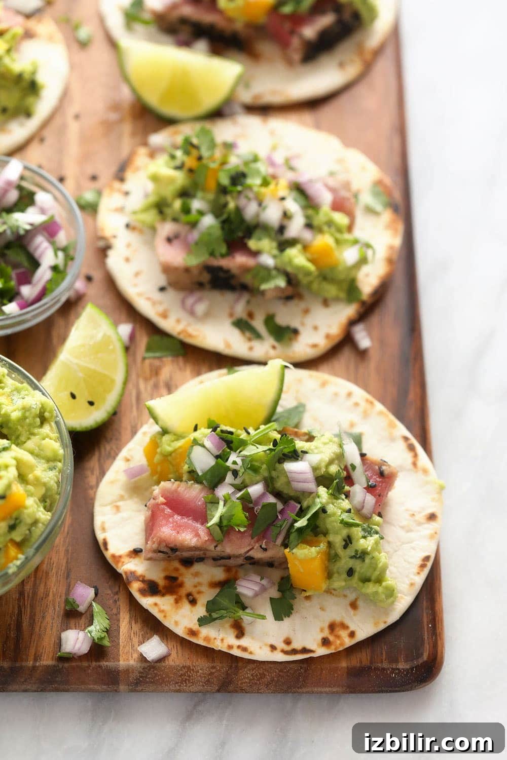 Ahi tuna tacos ready to serve Ahi tuna tacos on cutting board