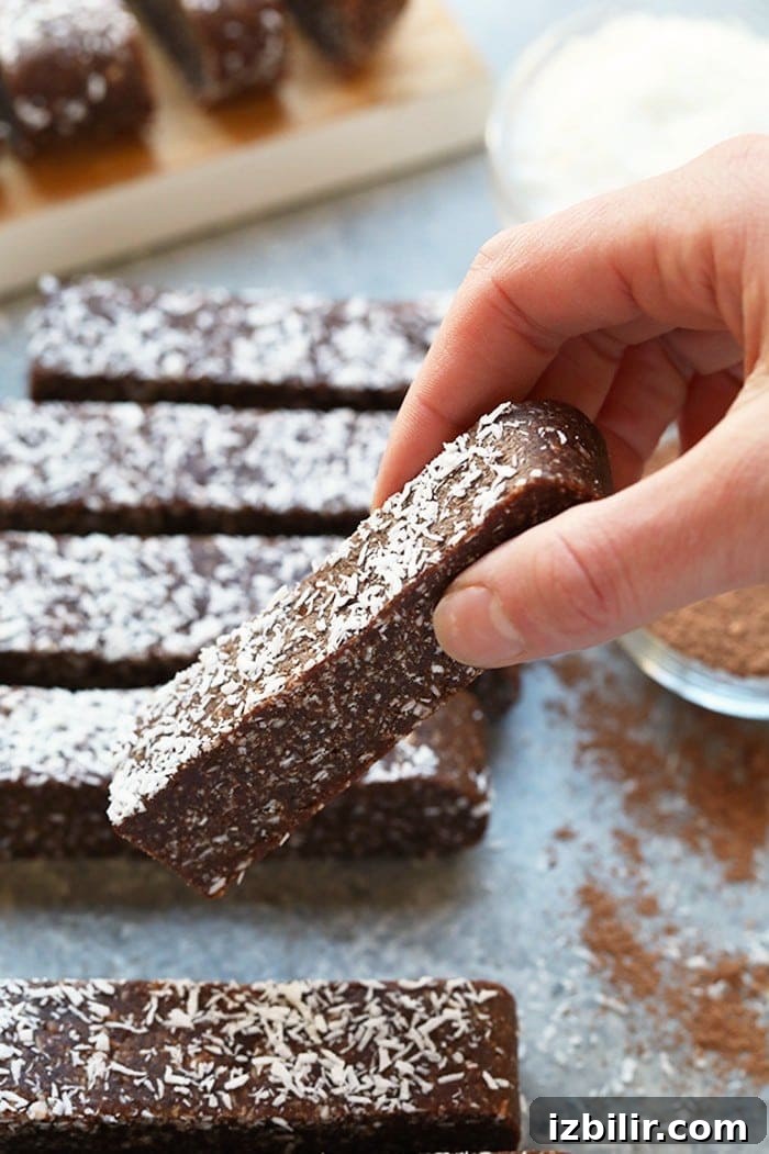 No-Bake Chocolate Coconut Energy Bars Recipe 2 No-Bake Chocolate Coconut Energy Bars - naturally sweetened snack made with dates, coconut and cashews