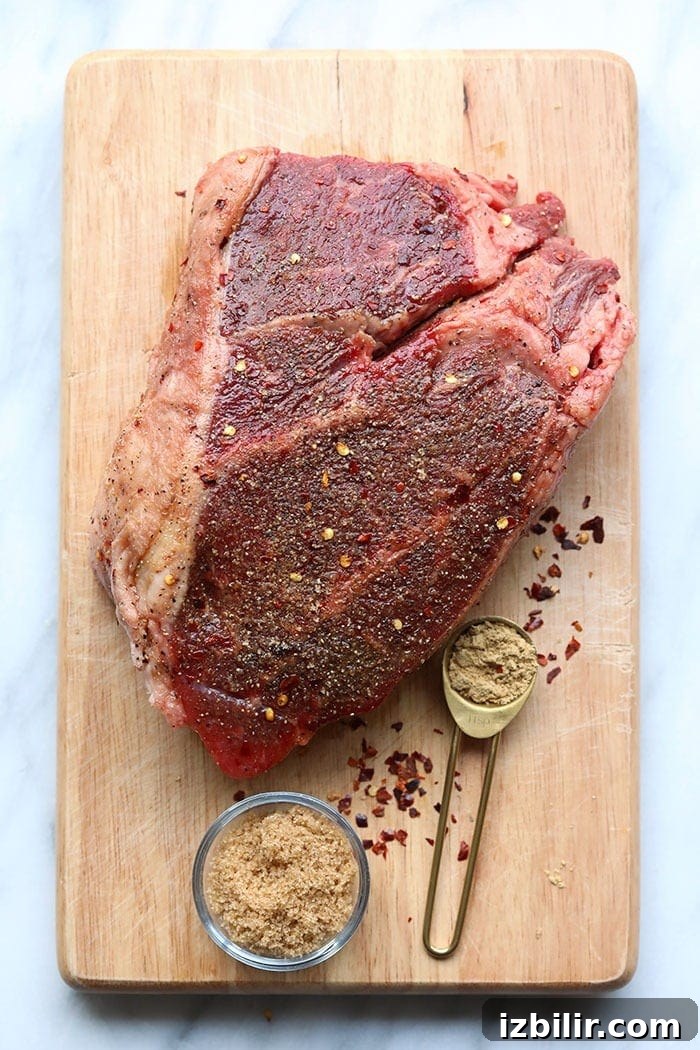 Boneless beef chuck roast A chuck roast on a cutting board